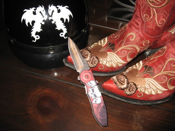 GG Buck Knife, Dragon Helmet and Old Gringo boots.