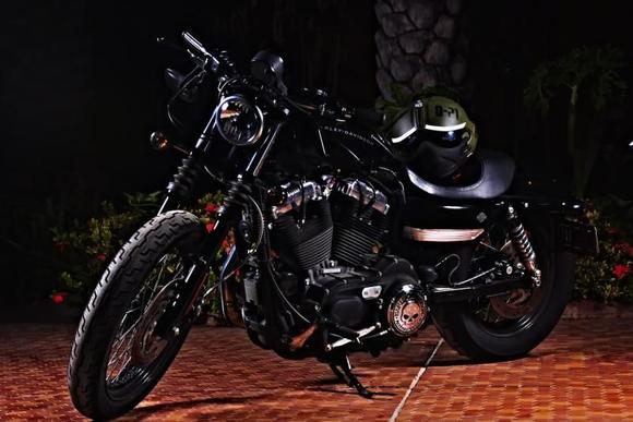 Nightster '09 with some mods:

Drag Bar
Nostalgic grips
Smoked and relocated turn signals
Forward Controls
Willie G Gas Cover
Willie G Derby Cover
Willie G Forward control linkage
Blacked out Primary cover
SE Stage II air intake

I think thats about it..... definitely more to come