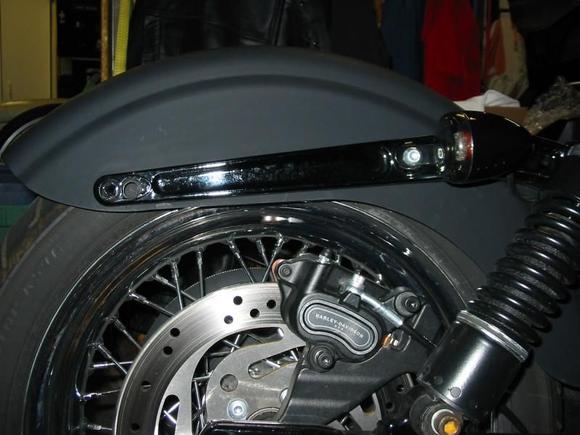 Rear sig relocation from side