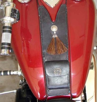 Another view of the tank bib. The concho is sterling silver with 2 horsehair tassels. The Phoenix Bird pouch snap is sterling also and is from Bangkok Thailand