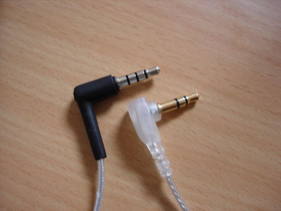 The one with the 3 black spacers is a TRRS, which has a mic. The one with 2 black spacers is for a standard set of earbuds without a mic. Which type works with that adapter?