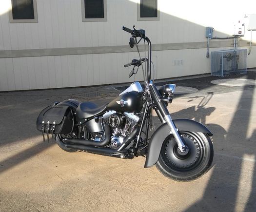 2010 Fatboy lo.  Anyone running an oil cooler?  Jagg?  Is it worth it?  Issues?
