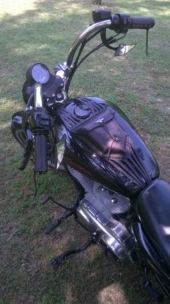 Leather Tank bag with flint arrow head for the tie down.