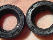 I bought the new seal from Red's Auto Rehab on Ebay for $10 delivered (o-ring included). It fit perfectly. 
The bearing was fine (I didn't have a replacement,anyhow.) But, I did note the markings ...JAPAN NSK 6000DU.