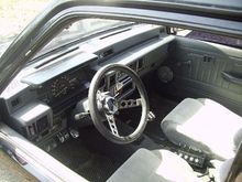 aloot done to the interior some fiberglassing,added speakers in the doors,steering wheel..10switch,and to top it all off tweed honda prelude bucket seats,i miss this truck..