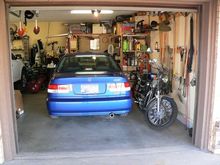 Si in the garage, with friend (2003 Suzuki Intruder 1400)