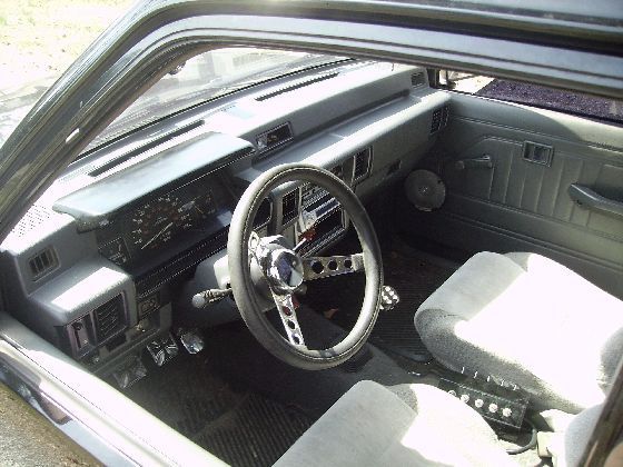 aloot done to the interior some fiberglassing,added speakers in the doors,steering wheel..10switch,and to top it all off tweed honda prelude bucket seats,i miss this truck..
