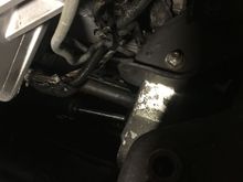 This picture shows the “center” section of the cooler lines....the black metal bracket