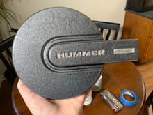 Example (sample) of a center cap spray painted with Rust-oleum in matte hammered. Used a dremel to remove the paint over the Hummer label and accent. 