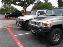 3 Hummers in the parking lot...went to see my daughter's play in McKinney and also got to see these.