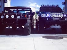 1995 AM General Hummer H1. And 2005 Hummer H2 Decked out to tha bone