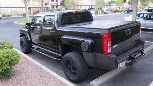 Extang Solid Fold bed cover, black gas cover, black powder coat nerf hitch step bar, tailgate lock