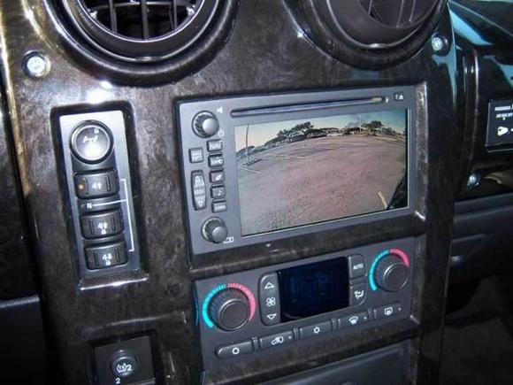 Switchable or automatic backup camera display