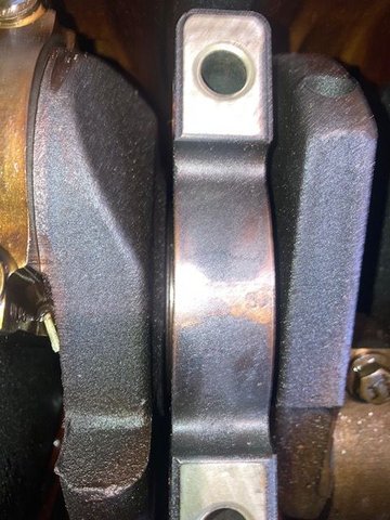 Bearing Caps: Pay Attention to the number, as well as the direction of which way to install them.  The arrow is pointing towards the FRONT of the engine.  