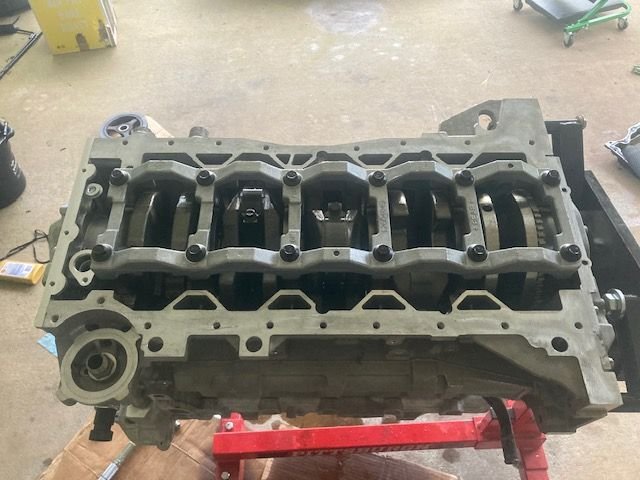 Bottom end completed.  The Main Bearing Brace Bolts are tightened to 18 ft-lbs followed by an additional 180 degrees.  Reference the Schwartz Service Manual for the correct order (also shown in the next picture).  