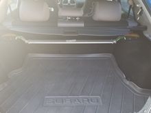 Trunk, includes all weather mat and roll out trunk cover