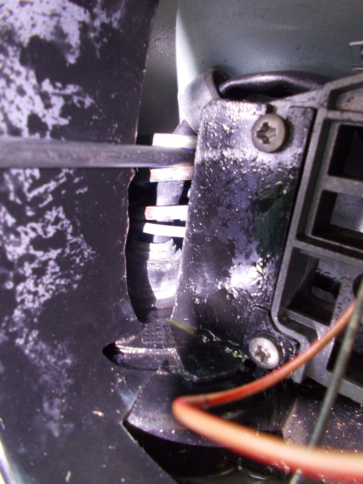 The spring mount and post showing the powdering as the 