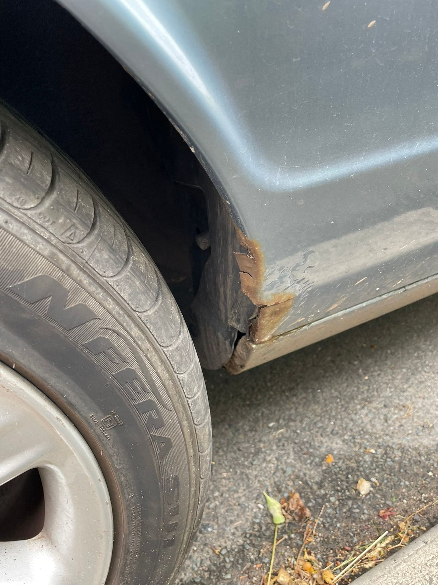Front wing corrosion, there�s a hole in this now where my finger went through it. 