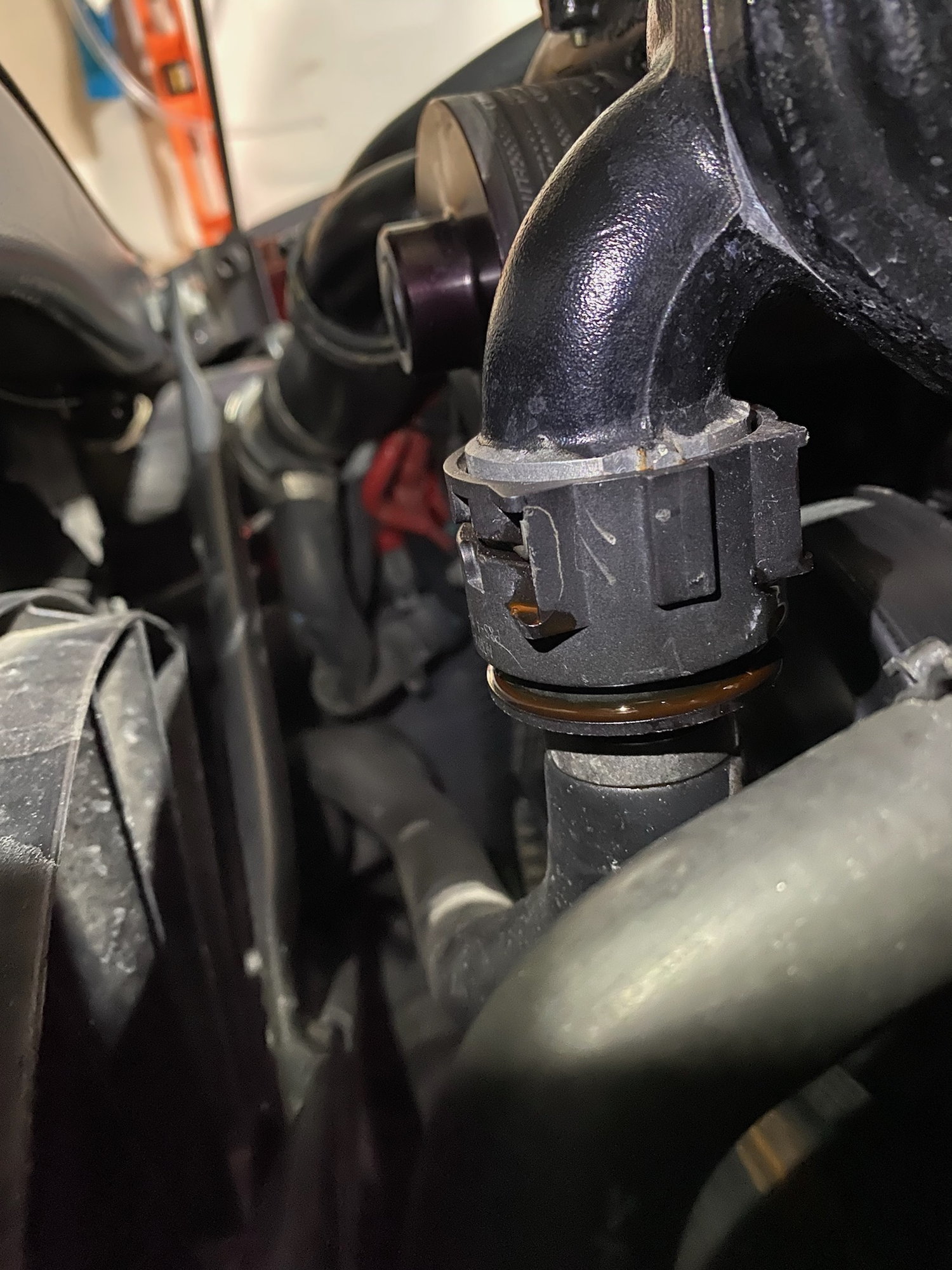 Coolant Hose on Bottom of Carburetor is Cracked and leaking coolant - Part  Number