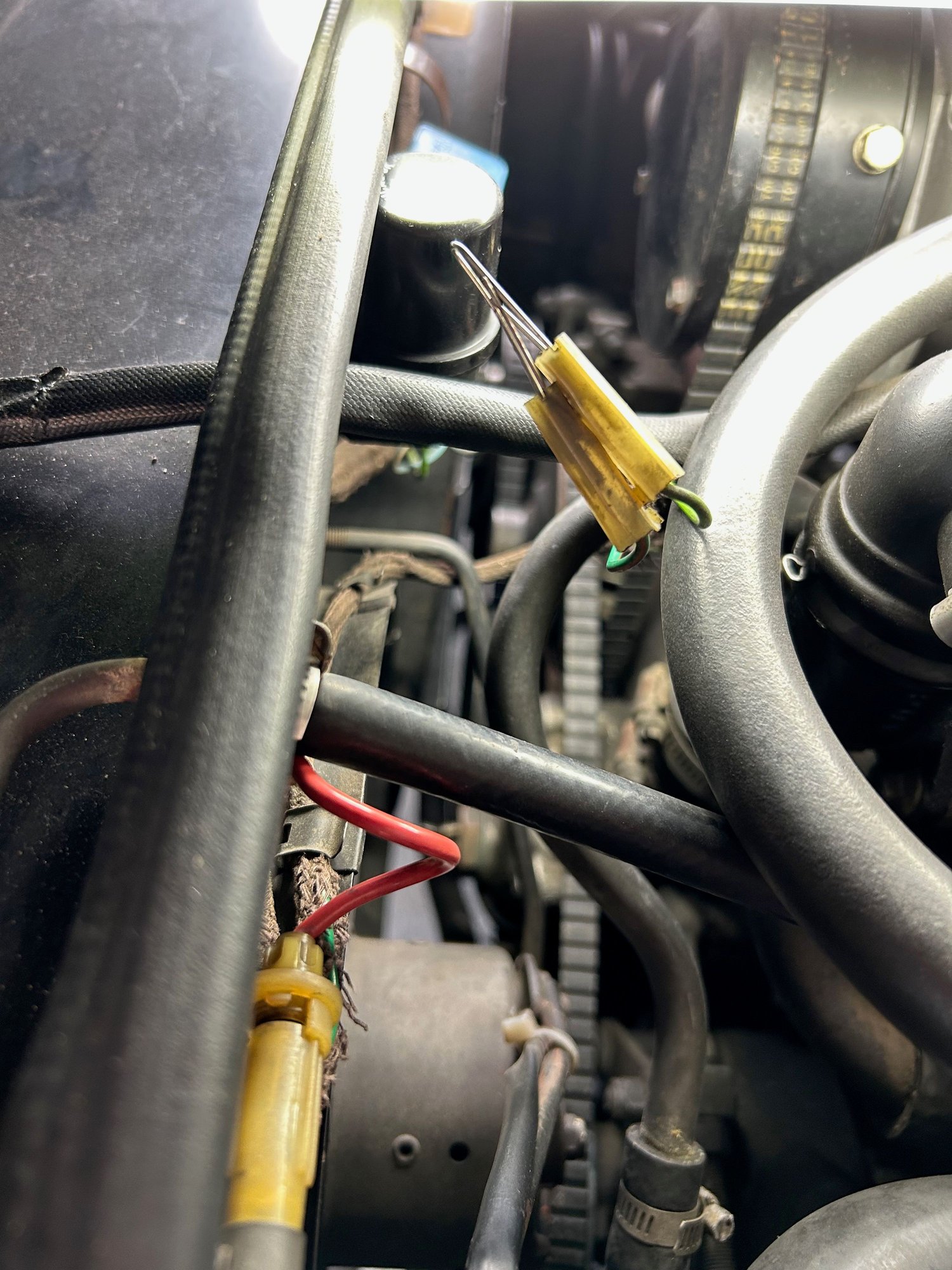 Jumping the two wires from the temp sensor, which I believe should switch on the Aux Fan.