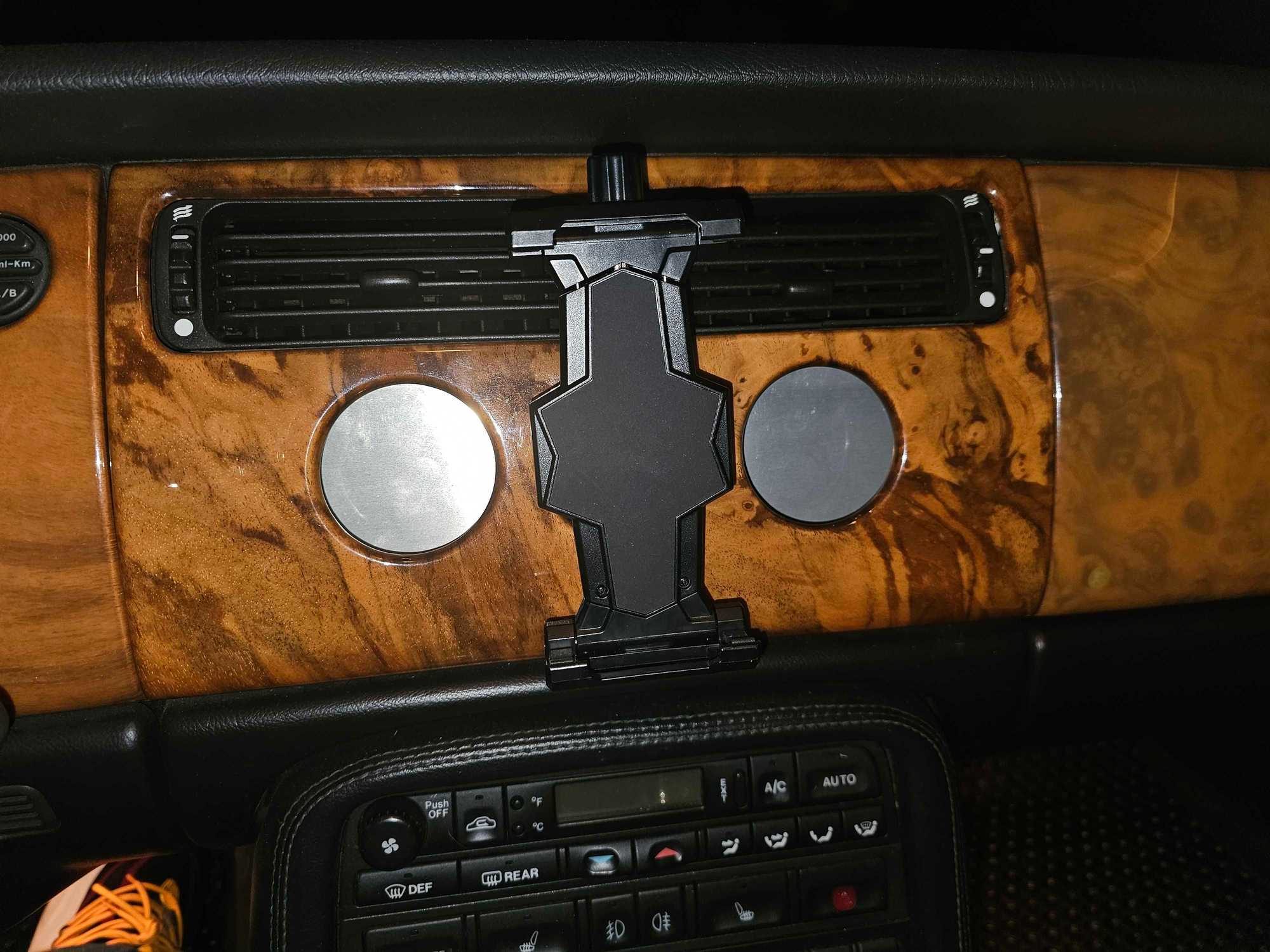 Bracket screwed onto plate.