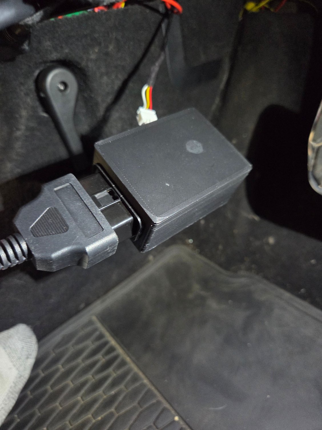 The adapter plugged in to the obd extension.