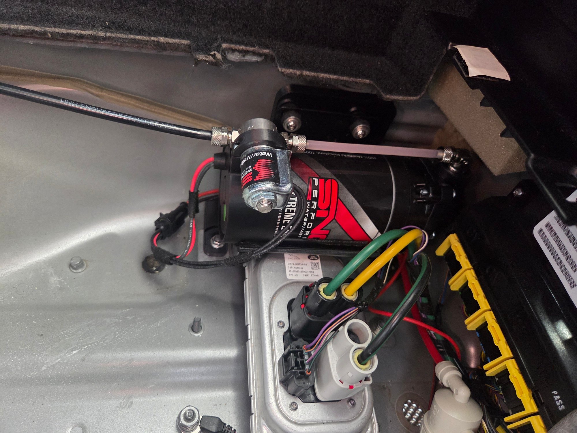 Pump for water meth located in trunk.