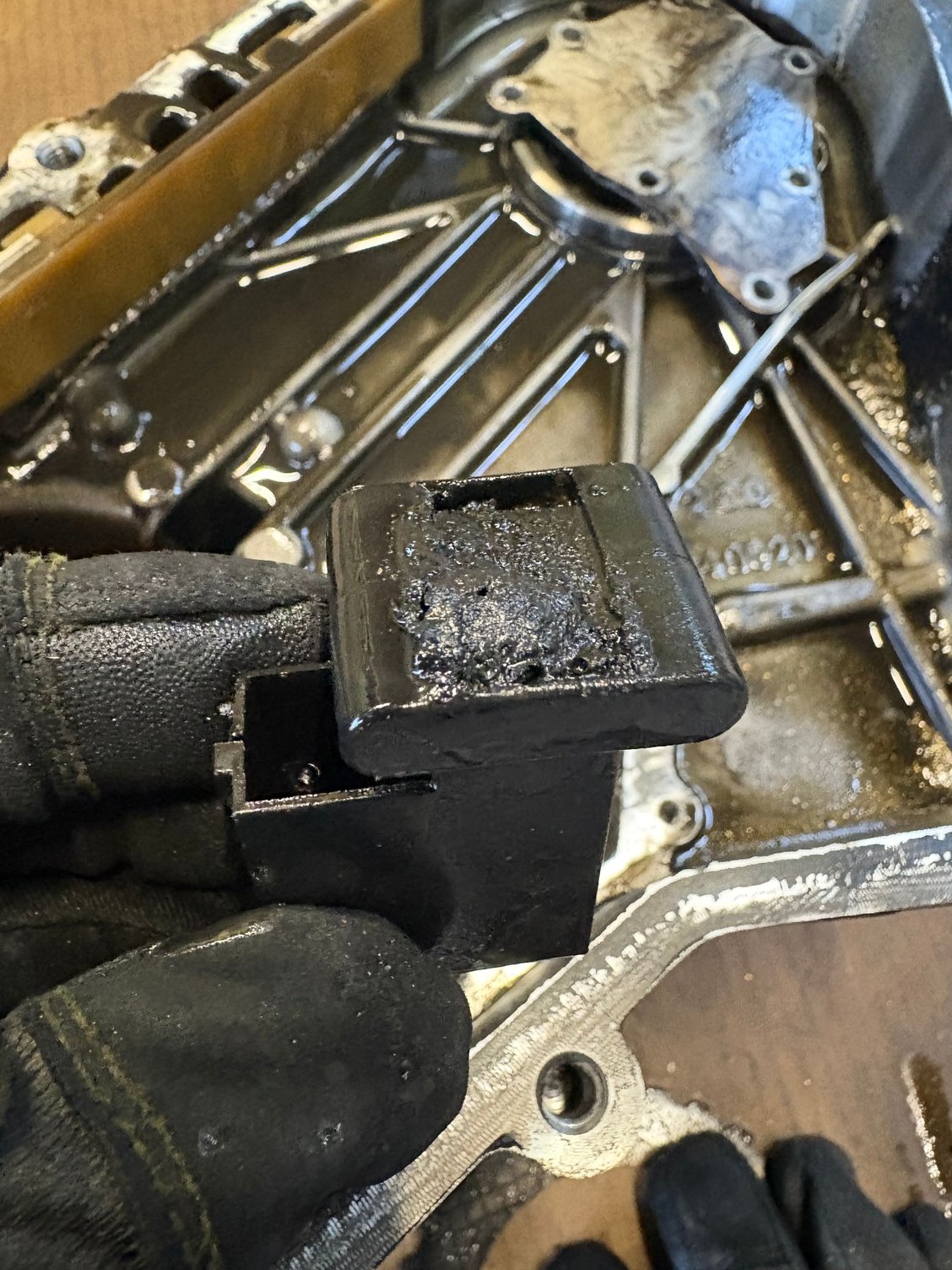 Oil has to drain through this. It is extremely clogged. It is the possible point of failure. If pump doesn�t get a constant flow of oil, the clutch pack can�t hold tight. It will slip and create heat� and weld itself together.