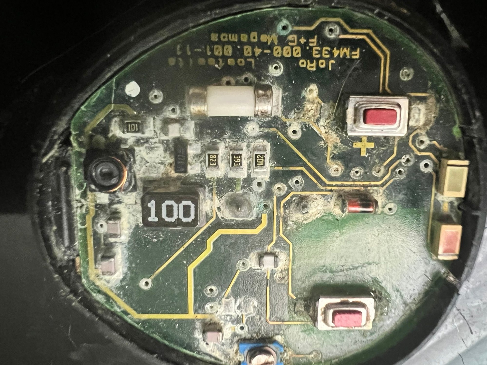 I think the + tab is soldered next to that coil and that has to be desoldered