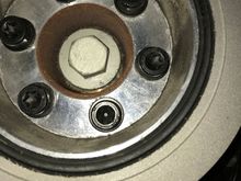 OEM bottom pulley. Accessed from under car. T50 bolts