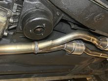 From under the left side