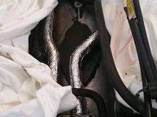 new hoses! yayy! used older spring clamps and right after them used screwdriver clamps so they will never leak!