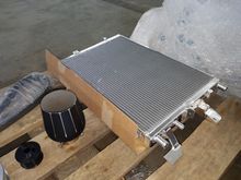 Aftermarket supercooling radiator, very well made. Was totally custom and that part alone took over a month to receive as it was being custom made.