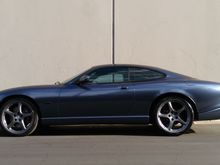 Just picked up the Coupe late last night.  Needs a few minor tweaks, but here is the new color.
the color is Gloss Glacier Grey by 3M 1080
It is color change, meaning the front end of the car is in the shade, and appears as a glossy dark greyish blue black. When the sun hits it, it is metallic as seen on the boot area. BBS wheels are gloss metallic graphite grey, Brembos are metallic purple.