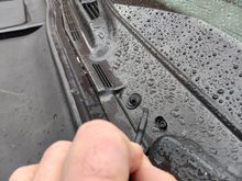 Image shows hose coming from wiper, cracked on the end.  Am I missing a fitting