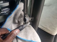 Started to trim the metal. The seat leather is attached to it, so I was sure to leave enough for it to still be sturdy. 

Side note. Those cutoff disc tend to break off easily. So eye protection is a must. I ended up going thru about 10 of them on the 1st 2 brackets! Its not the cost that bothers me but having to unscrew/ rescrew a new one in. Eats up so much time. Be prepared to swear a lot. I have some better ones for the other seat.