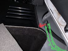 The rear side window drains can rattle against the plastic part as shown by the red arrow. One of my sides was clipped into a holder right at the very bottom and will be held taught and away from the contact point as shown in the photo. My other drain was just hanging loose which then lies in the path of the green dots and can rattle. It is hard to put the loose end back into the clip as it is right down the bottom and you are doing it blind and by feel only and you don’t want to create a kink.
