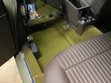 Original carpet with new seat covers. 