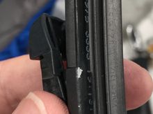 Jaguar wiper blade with Valeo name imprinted on the wiper strip.
