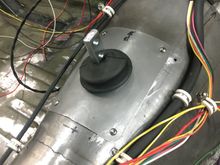 Shifter will sit slightly left and reward in the factory console hole.