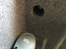 Screw above the Power Socket