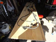 Harness layed out to unwrap and inspect