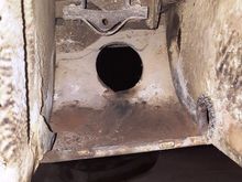 (above) View from where rear muffler sits out the exhaust hole opening.  Ledge below hole was full of rocks and dirt.  Don't believe that was from me (below)