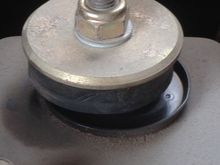 Bushing has separated from metal plate. Very soft as dough