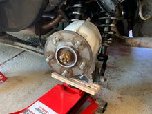 The hub only needs to go up a fraction of an inch to take the weight off the pin