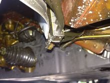 Camera position right behind left front wheel looking forward in 45 degree angle. The brownish stuff is the anti-corrotion material.