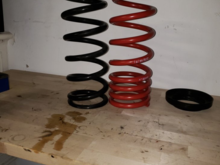 Rear spring comparison...  (MUCH beefier  - they are also upside down)