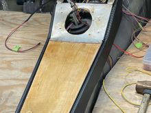 Shifter hole cut, covering the wood in leather.  Will attempt a leather boot.