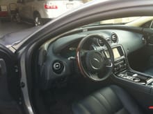 I really like the wood steering wheel as it doesn't show wear like the full leather steering wheel.