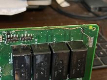 I recommend soldering on the trace shoulders, as seen here, rather than on the line which borders the edge. For obvious reasons. The damage is case chafing so we want to avoid that..